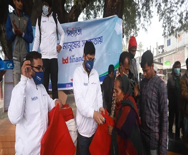 Bangladesh Finance volunteers handing out winter relief